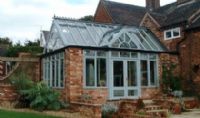 Stunning conservatory with glazed gables in Walcott blue
